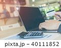businessman hands holding credit card on computer 40111852