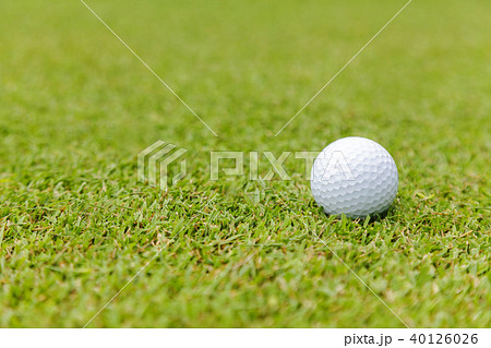 Golf ball on green grass on golf course Golf ball on green grass on golf course 40126026