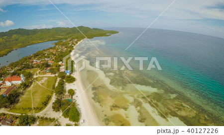 Filipino coast near with sea, Bohol Island, Philippines. Aerial view. Anda city. 40127226