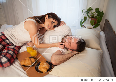 a man and a woman in the morning breakfast in bed a man and a woman in the morning breakfast in bed 40129014