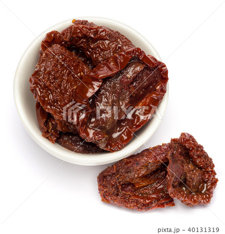 Canned Sundried or dried tomato halves in ceramic bowl Canned Sundried or dried tomato halves in ceramic bowl 40131319