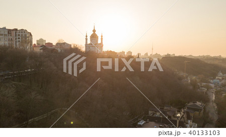 Sunset over Saint Andrew's church in Kyiv, Ukraine. Sunset over Saint Andrew's church in Kyiv, Ukraine. 40133103