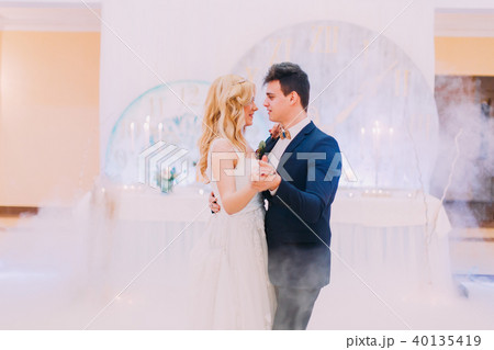 Happy bride and groom  gracefully dance. Wedding celebration 40135419