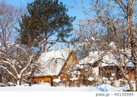 new wooden cottage in russian village in winter 40138994