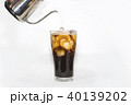 milk pour over ice coffee in white background 40139202
