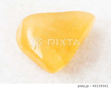 polished yellow Aventurine gem stone on white polished yellow Aventurine gem stone on white 40139381