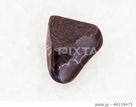 pebble of jaspilite jasper gemstone on white pebble of jaspilite jasper gemstone on white 40139473