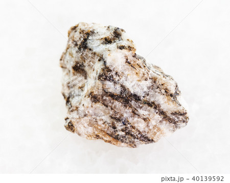 raw Gneiss stone on white marble 40139592