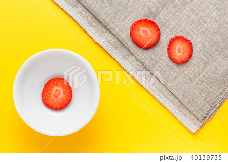 Three fresh slices of strawberry. 40139735
