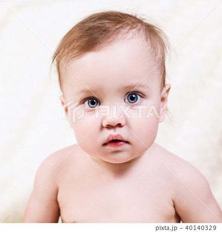 cute little baby looking in the camera. 40140329