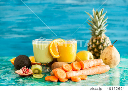 Front view of two glasses with detox smoothies Front view of two glasses with detox smoothies 40152694
