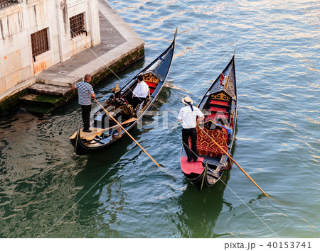 Two Gondolier rides gondola on the Grand Channel Two Gondolier rides gondola on the Grand Channel 40153741
