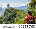 Tourists take pictures of the castle of San Marino 40153763