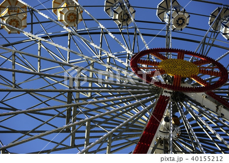 ferris wheel in amusement park on blue sky 40155212