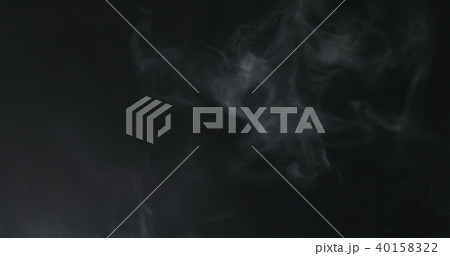 vapor steam rising over black background 40158322