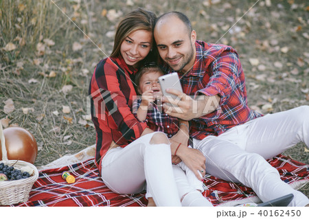 family in a field 40162450