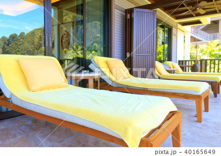 Yellow sunbeds on the balcony room Yellow sunbeds on the balcony room 40165649