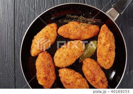 fried meat croquettes on a skillet fried meat croquettes on a skillet 40169255