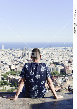 young man with Barcelona, Spain, below him 40177567