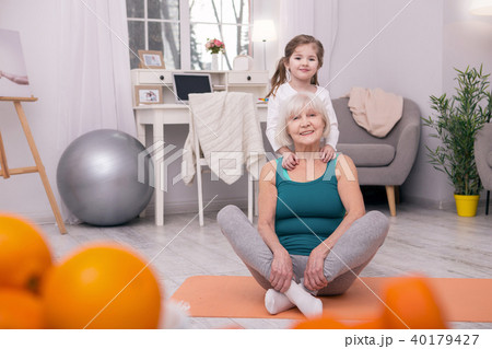 Adorable girl hugging her grandmother 40179427