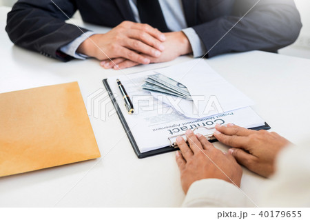 Corrupted businessman, or politician bribe in the form of hundre 40179655