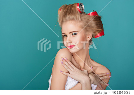funny blond woman over blue background 40184655