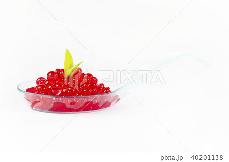 Plastic spoons with fish caviar on a white backgro Plastic spoons with fish caviar on a white backgro 40201138