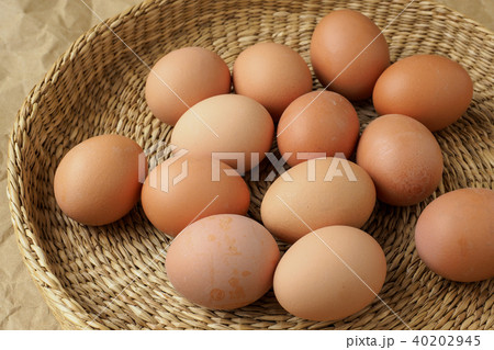 Brown eggs in the basket. Dietary products. Brown eggs in the basket. Dietary products. 40202945