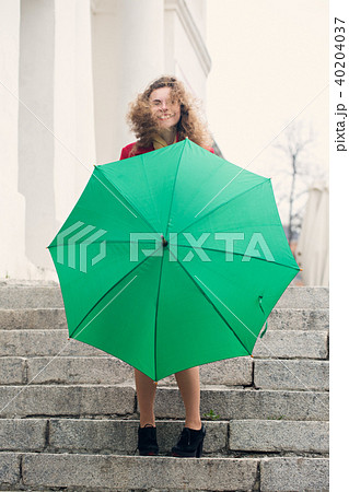 Woman in windy weather Woman in windy weather 40204037