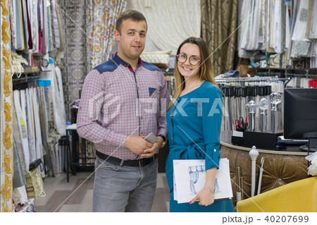 Male businessman and female designer. 40207699