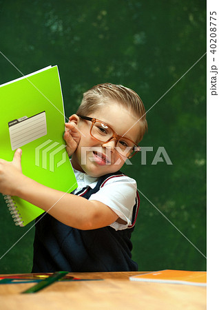 Cute positive little boy with glasses 40208775