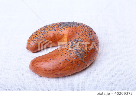 Many mixed breads and muffins on white background. 40209372