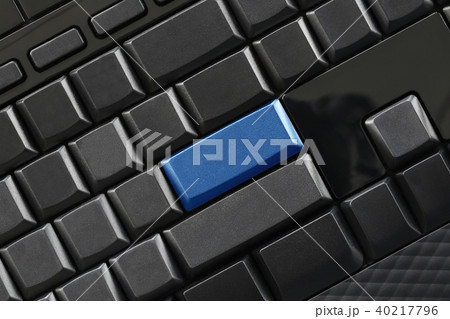 Empty black button and blue Keypad enter of computer keyboard. 40217796