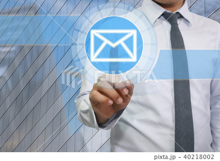 Hand of businessman use finger touch icon of envelope or e-mail system. Hand of businessman use finger touch icon of envelope or e-mail system. 40218002