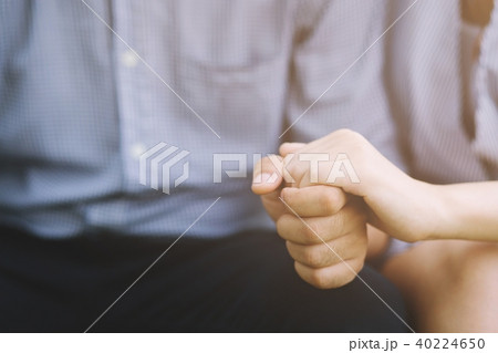 Woman and man holding hands Woman and man holding hands 40224650