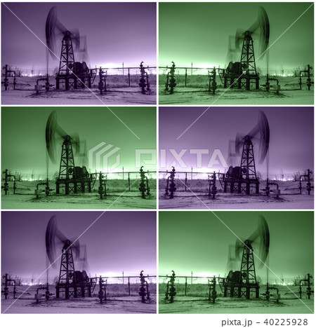 Working oil pump jack at night time 40225928