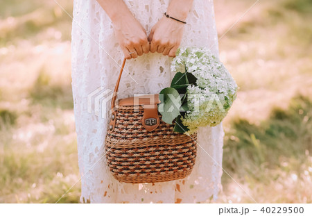 girl dress bag hold flowers bouquet white 40229500