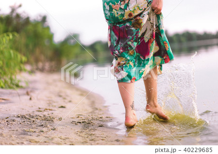 splashing water barefoot woman beach dress splashing water barefoot woman beach dress 40229685