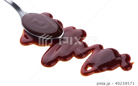 Barbecue sauce with spoon isolated on white background 40239571
