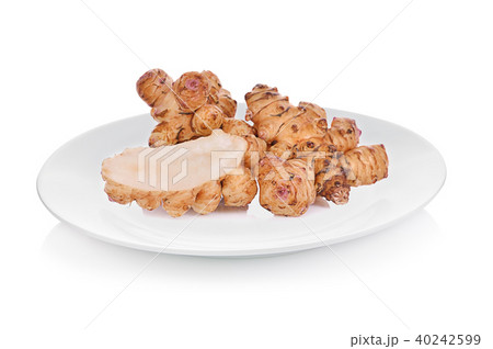 Sunchoke on plate isolated on white background. Sunchoke on plate isolated on white background. 40242599