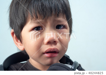 Close up Crying Little asian boy. Close up Crying Little asian boy. 40244825