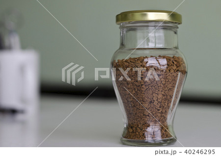 A glass filled with instant coffee 40246295