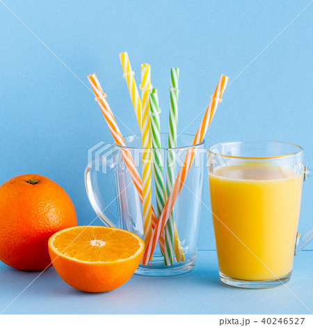 Orange juice on a blue pastel background 40246527