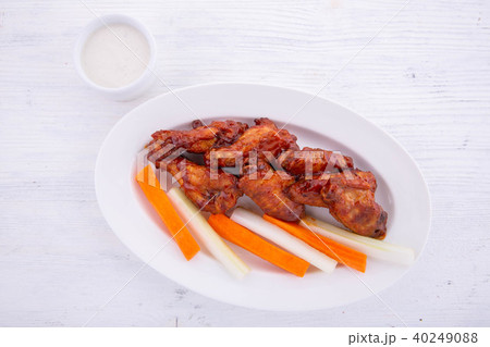 The celery and carrots, is served with chicken win 40249088