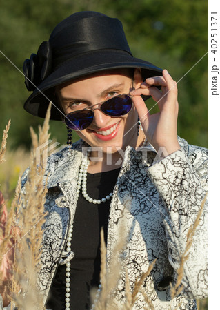 woman in dry grass woman in dry grass 40251371