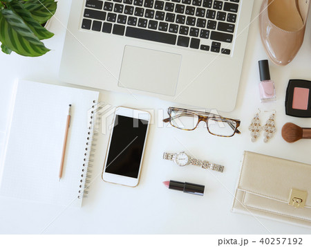 flat lay woman workplace with laptop ,smart phone flat lay woman workplace with laptop ,smart phone 40257192