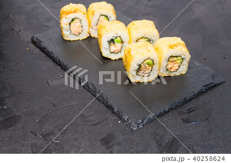 Hot Sushi roll with salmon. Japanese food. 40258624