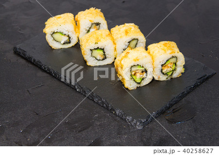 Hot Sushi roll with salmon. Japanese food. 40258627
