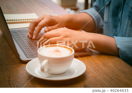 Businessman typing the data into laptop Businessman typing the data into laptop 40264835