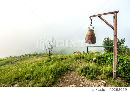 Mountain view with big bell at hill 40268059